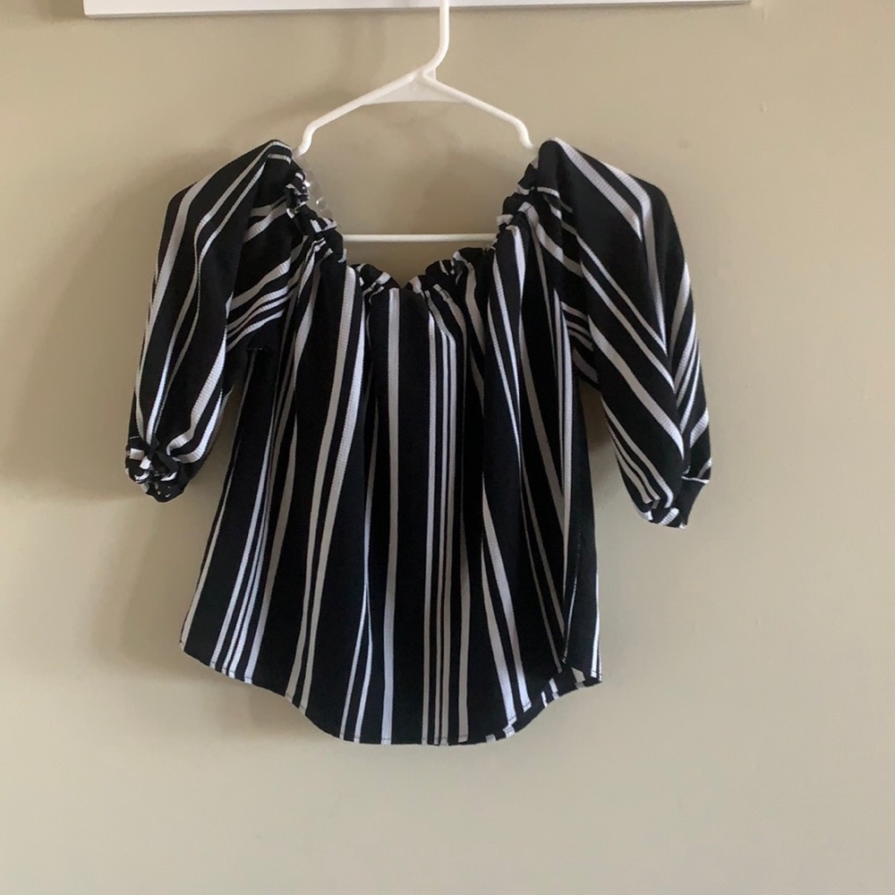 Black and white off the shoulder shirt